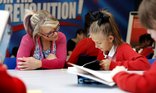 Training - teacher in red