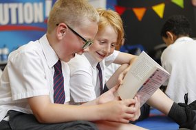 Happy boys reading