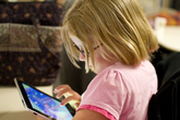 5 yo reading on screen