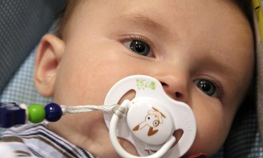 Baby with dummy