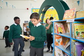 Primary children in school library