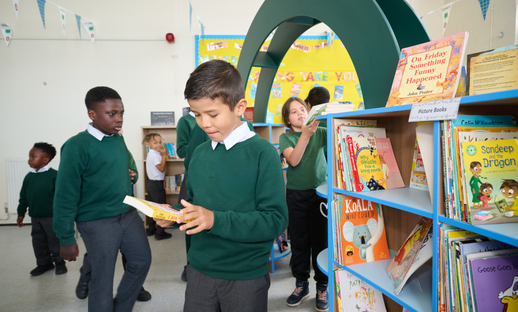 Primary children in school library