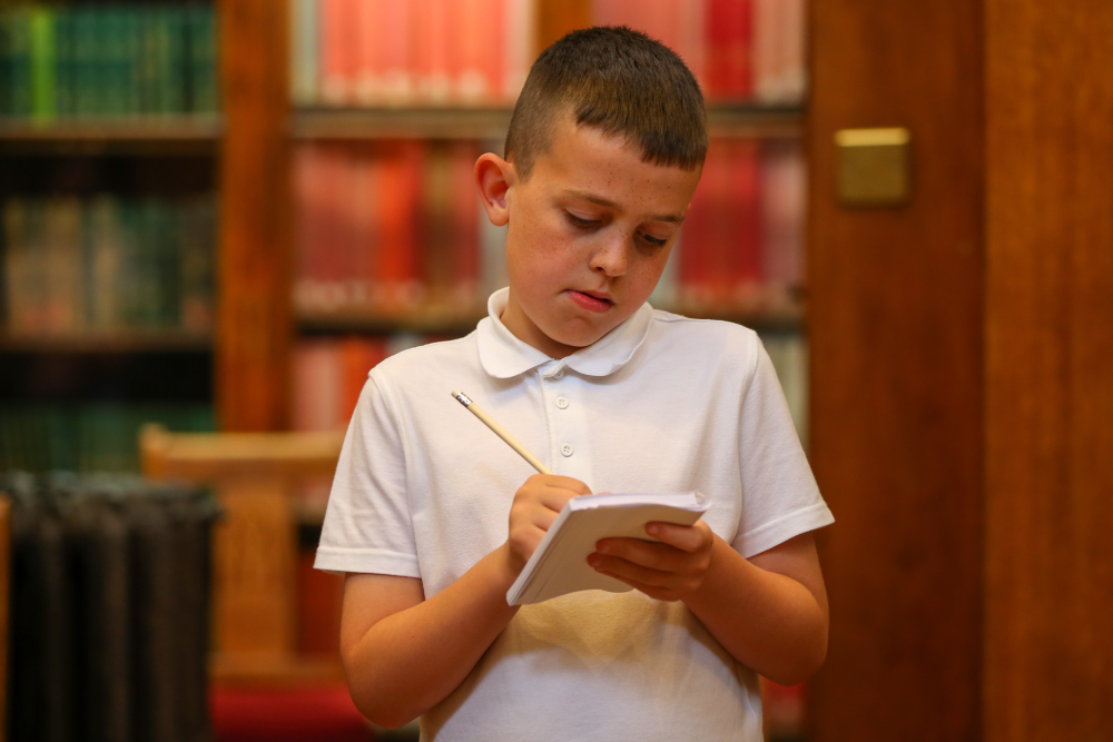 Primary child writing