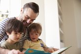 Dad reading with sons.jpg