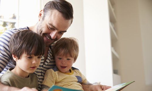 Dad reading with sons.jpg