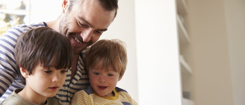 Dad reading with sons.jpg