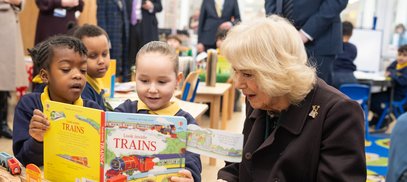 Her Majesty The Queen with two Reception pupils