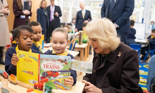 Her Majesty The Queen with two Reception pupils
