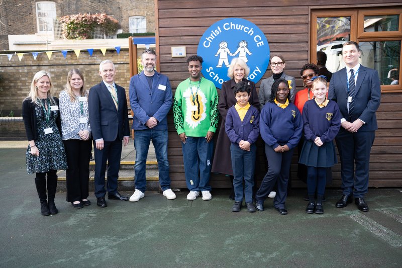 Her Majesty The Queen opens Christ Church Primary School's new library with pupil librarians, teachers and authors