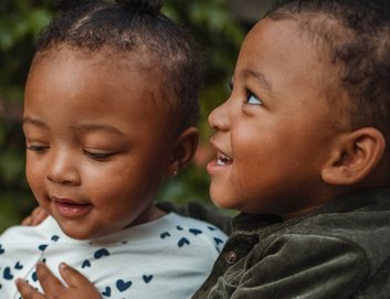 Early Words Matter child laughing