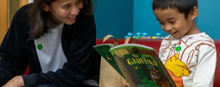 EWM The Gruffalo_Liverpool launch_child reads The Gruffalo with his mum
