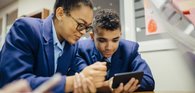 Girl & boy using tablet