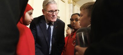 Jayden (right) talking to PM Keir Starmer