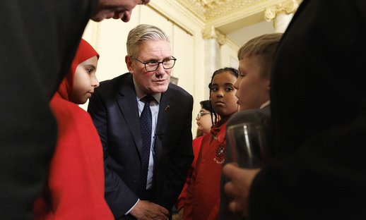 Jayden (right) talking to PM Keir Starmer