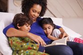 Mum reading with son and daughter.jpg