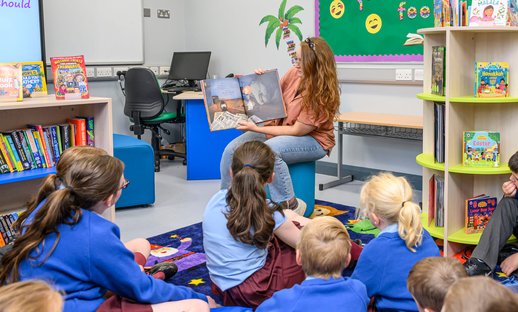 Teacher sharing a story with class