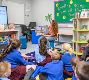Teacher sharing a story with class