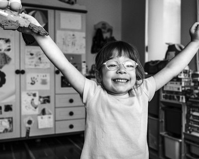 Young girl on her own looking happy