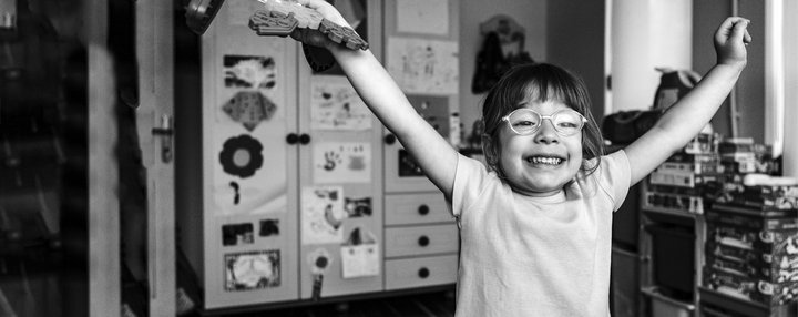 Young girl on her own looking happy