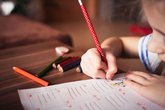Pexel close-up-of-girl-writing-256468.jpg