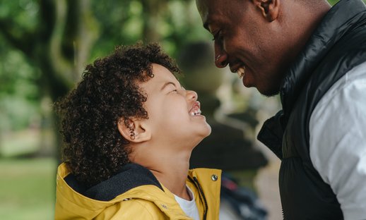 dad and boy outside looking at each other.jpg