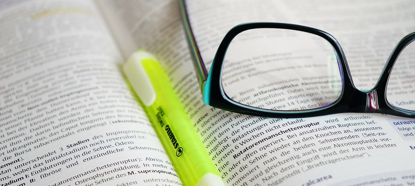 Notebook and glasses