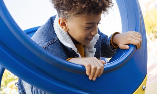 little-boy-having-fun-playground