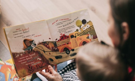 Stock photo - parent reading with child