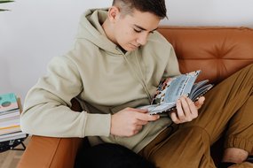 teen boy, book
