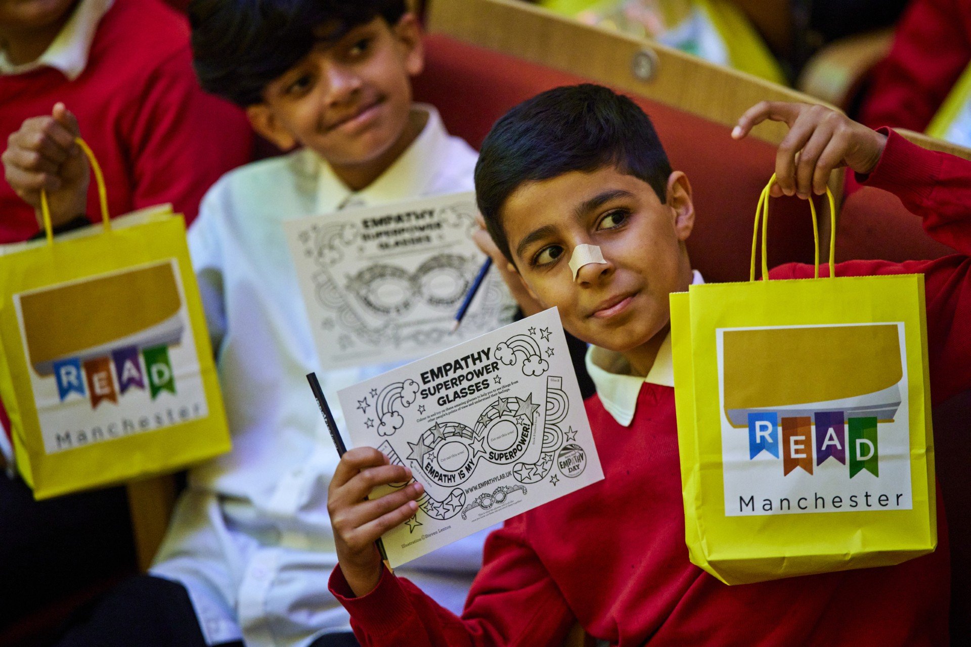Children with books empathy day Mcr
